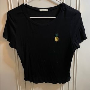 black crop top with pineapple